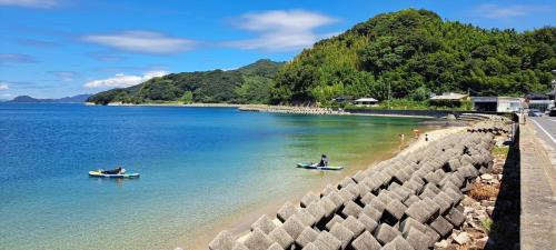 a group of people on boats in the water at ImagineWestOcean - Vacation STAY 15851 in Suo Oshima