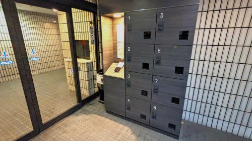 a room with gray lockers in a building at Space Minami 4jo - Vacation STAY 17247 in Sapporo