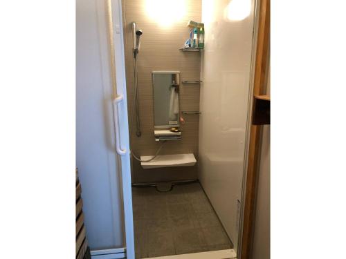 a bathroom with a sink and a mirror at LongHillsEcoGuesthouse&Cafe - Vacation STAY 24885v in Kinoshita