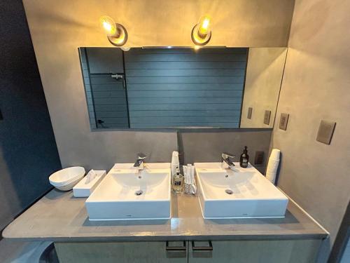 Bilik mandi di しばママのお宿 ShibaMamas Casual Hotel
