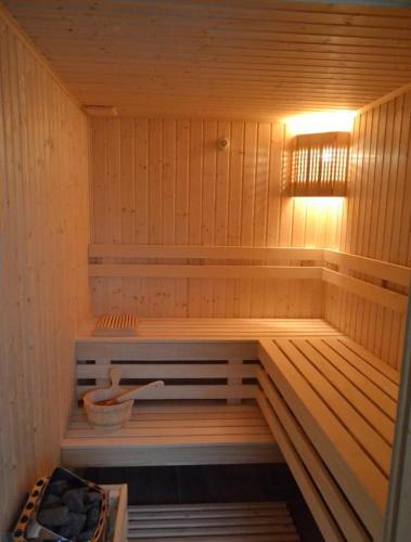 a sauna with a light on top of it at White Rock Castle Apartments - Pool & SPA in Balchik