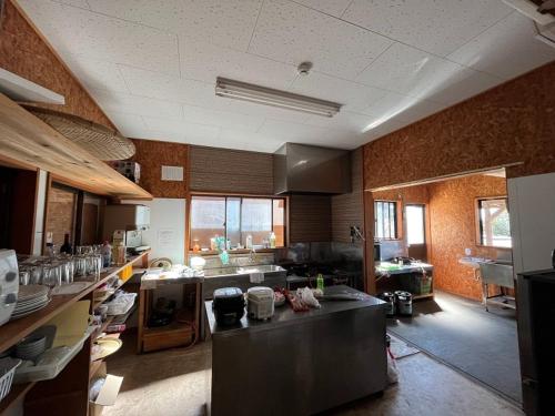 a large kitchen with a large counter in a room at Hasaki Seaside Campsite - Vacation STAY 51114v in Shari