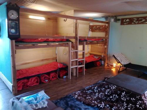 a room with three bunk beds in a room at Cabochon Camp - Vacation STAY 69145v in Ushuku