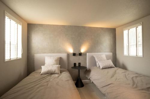 Ένα ή περισσότερα κρεβάτια σε δωμάτιο στο LUCY RESORT - Vacation STAY 77593v