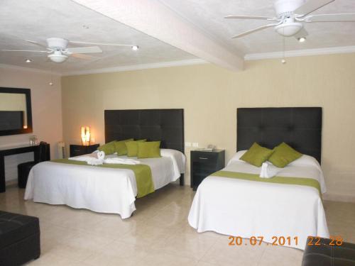 Ένα ή περισσότερα κρεβάτια σε δωμάτιο στο Hotel Gya Boutique