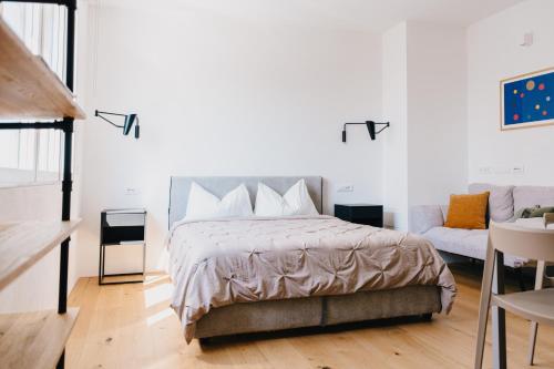 Ένα ή περισσότερα κρεβάτια σε δωμάτιο στο Le Calendule