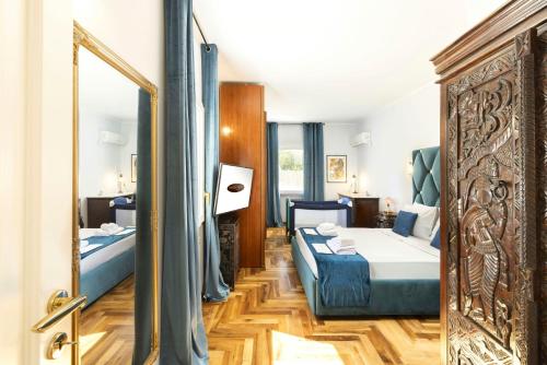 Ένα ή περισσότερα κρεβάτια σε δωμάτιο στο Luxury Seaside Villa Near Cagliari