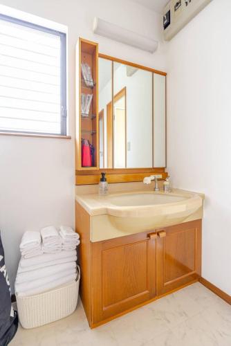 a bathroom with a sink and a mirror at Itoshima - House - Vacation STAY 16267 in Itoshima