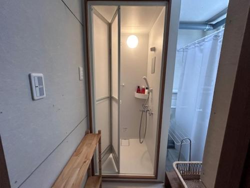 a shower in a bathroom with a glass door at Hakodate Kasumi - Vacation STAY 90771v in Hakodate