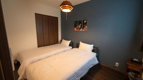 Postel nebo postele na pokoji v ubytování BLUE SOLARE 2 - Vacation STAY 15707v