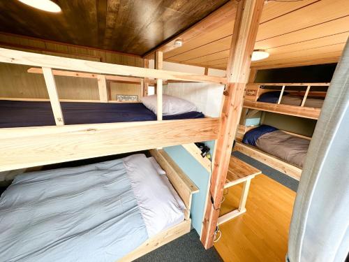 a bedroom with bunk beds in a boat at HAGINOTCHI - Vacation STAY 36993v in Shiraoi