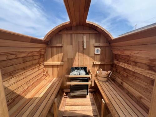 an inside of a sauna with wooden walls at OCEAN FRONT TATEYAMA - Vacation STAY 61331v in Tateyama