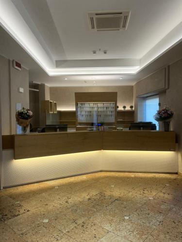 a lobby with a waiting room with aasteryasteryasteryasteryasteryasteryasteryastery at A Casa Dei Gonzaga, MantegnaHotels in Mantova