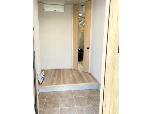 a hallway with a door leading into a room at nyans - Vacation STAY 60127v in Matsue