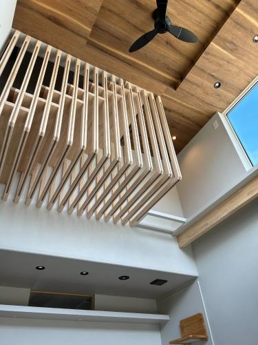 a wooden ceiling in a living room with a ceiling fan at nyans - Vacation STAY 60127v in Matsue