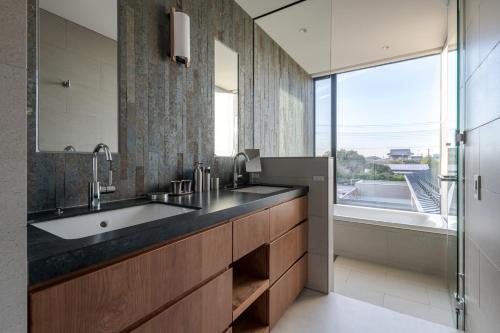 a bathroom with a sink and a large window at Kujukuri point 59 - Vacation STAY 49312v in Kujukuri