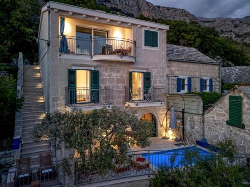 La alberca dentro o cerca de Apartment Villa Ivo - Makarska Exklusiv