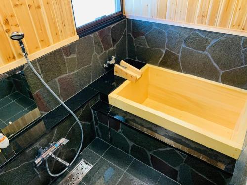 a bathroom with a sink and a shower at Minshuku Kunya - Vacation STAY 70157v in Fukai