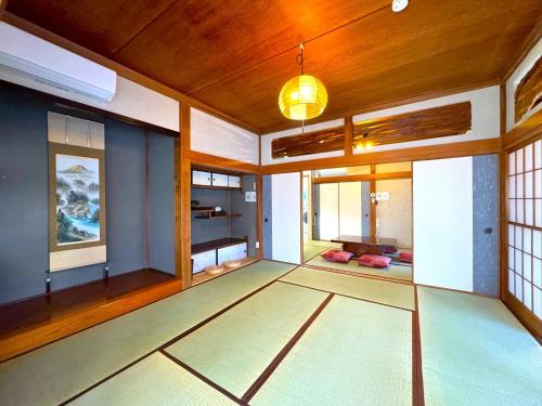 a room with a room with a table and a ceiling at ANGO KUJUKURI 3 - Vacation STAY 17094 in Kujukuri