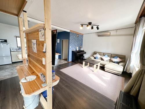 a living room with a couch and a table at Nobotchi - Vacation STAY 87218v in Noboribetsu