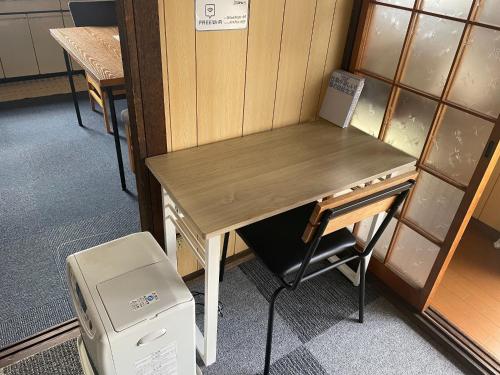 a desk in a room with a computer on the floor at Blue Bear - Vacation STAY 16900 in Nagahama