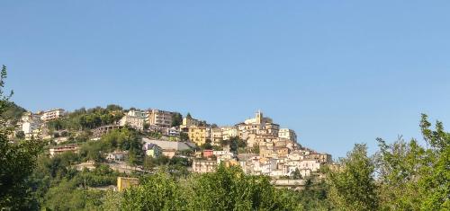 a mountain with houses on top of it at Amelia Sweet Home - Farindola in Farindola