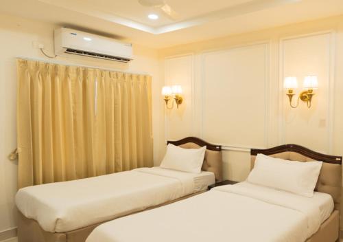 Postel nebo postele na pokoji v ubytování Hotel Granton