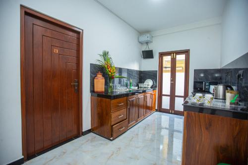 Η κουζίνα ή μικρή κουζίνα στο Villa Pearl Breeze