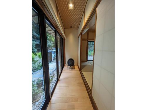 a hallway of a house with large windows at Shinra - Vacation STAY 29374v in Ise