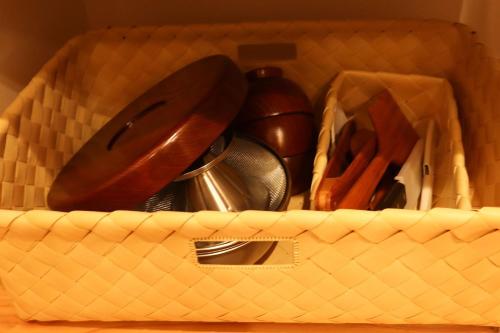 a basket filled with utensils and utensils at AsukanoMahoroba Hanare - Vacation STAY 17240 in Asuka
