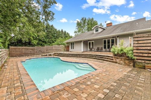 a swimming pool in the backyard of a house at New!! Pool Vibes At Vanishing Run in Harwood