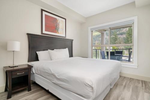 Ένα ή περισσότερα κρεβάτια σε δωμάτιο στο 2BR Suite with Scenic Views