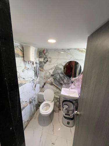 Ein Badezimmer in der Unterkunft Hotel Plus Point