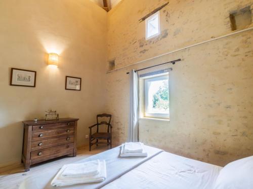 Postel nebo postele na pokoji v ubytování Domaine des Périès - Chambres d'hôtes