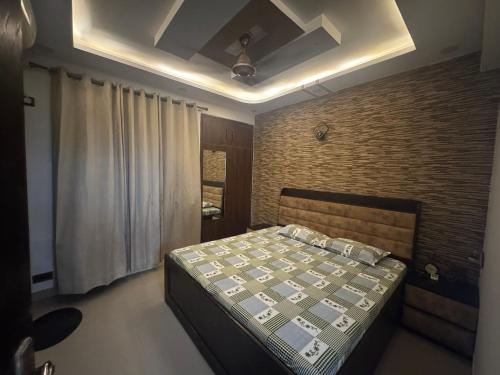 En eller flere senge i et værelse på Palm stays