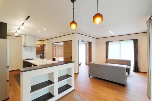 Ένα ή περισσότερα κρεβάτια σε δωμάτιο στο Rental villa with open-air hot spring bath "Rioren - Vacation STAY 54190v