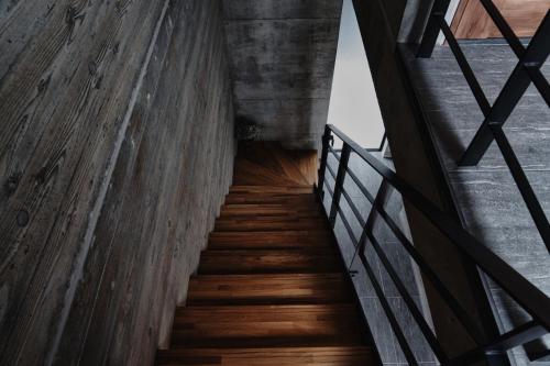 a staircase leading up to a building with wooden floors at RYUKYU BREEZE No,1, No,2, No,3, No,4 - Vacation STAY 91504v in Nago