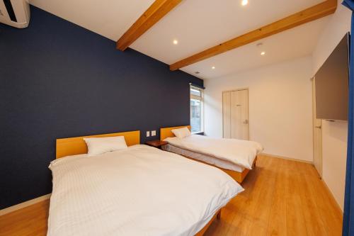 Giường trong phòng chung tại KAIBENBETSU NAGATO MISUMI - Vacation STAY 01952v