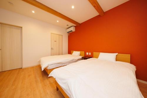 Giường trong phòng chung tại KAIBENBETSU NAGATO MISUMI - Vacation STAY 01643v