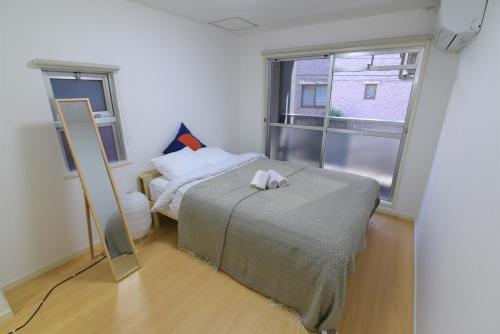 Katil atau katil-katil dalam bilik di Quayside Sakuragicho 201 - Vacation STAY 17682