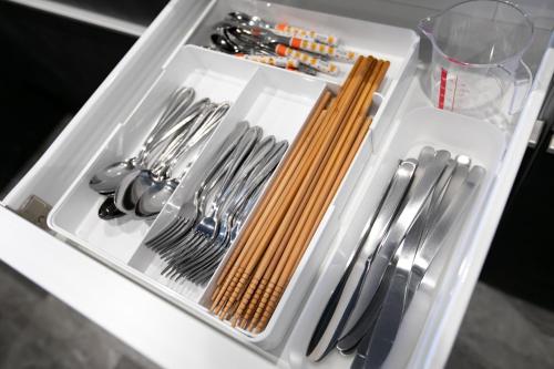 a drawer full of utensils in a refrigerator at S9W13 LABOINN - Vacation STAY 06250v in Sapporo