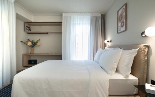 Gnamma Hotelにあるベッド