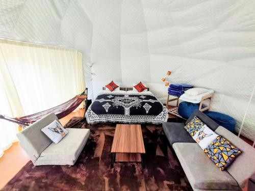 a room with a bed in a tent at Hakuba Mori no Wasabi Farm Auto Campsite - Vacation STAY 22260v in Hakuba