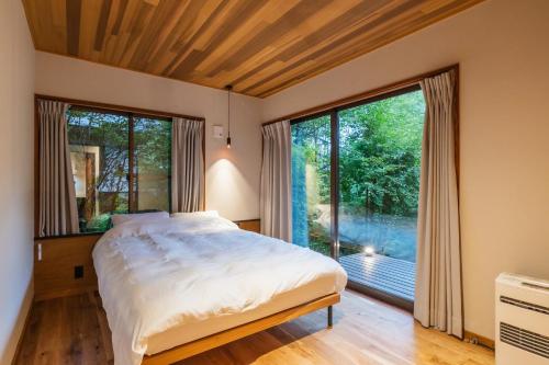 En eller flere senge i et værelse på COCO VILLA Yatsugatake - Vacation STAY 28845v