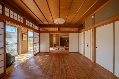 a hallway of a home with a wooden ceiling at Private Inn Kazu - Vacation STAY 56401v in Abuta