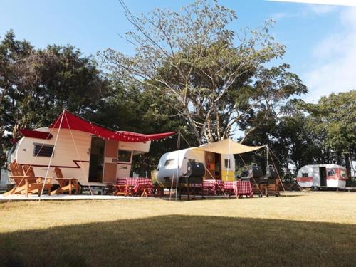 a campsite with a tent and tables and chairs at Beverly Glamping - Vacation STAY 82305v in Kakegawa