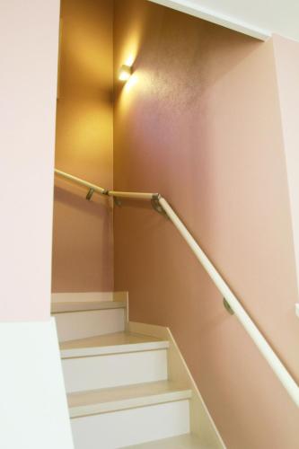 a set of stairs with a light on the wall at Building A - Vacation STAY 72692v in Kikuchi