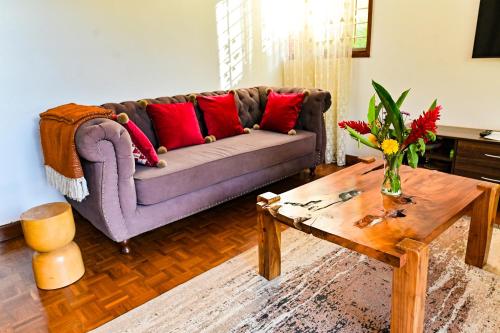 Ein Sitzbereich in der Unterkunft Pangolin Nest Boutique Hotel