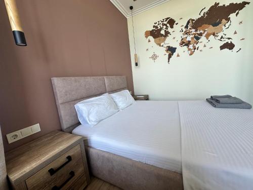Ένα ή περισσότερα κρεβάτια σε δωμάτιο στο MAGNIT Apartments у самого моря