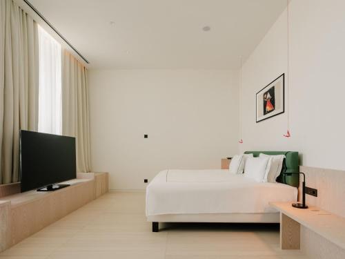 Televisyen dan/atau pusat hiburan di The Telegraph Hotel - The Leading Hotels of the World